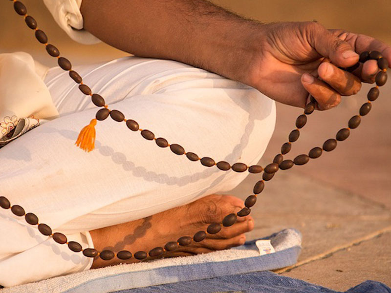 Japa meditation at sunrise